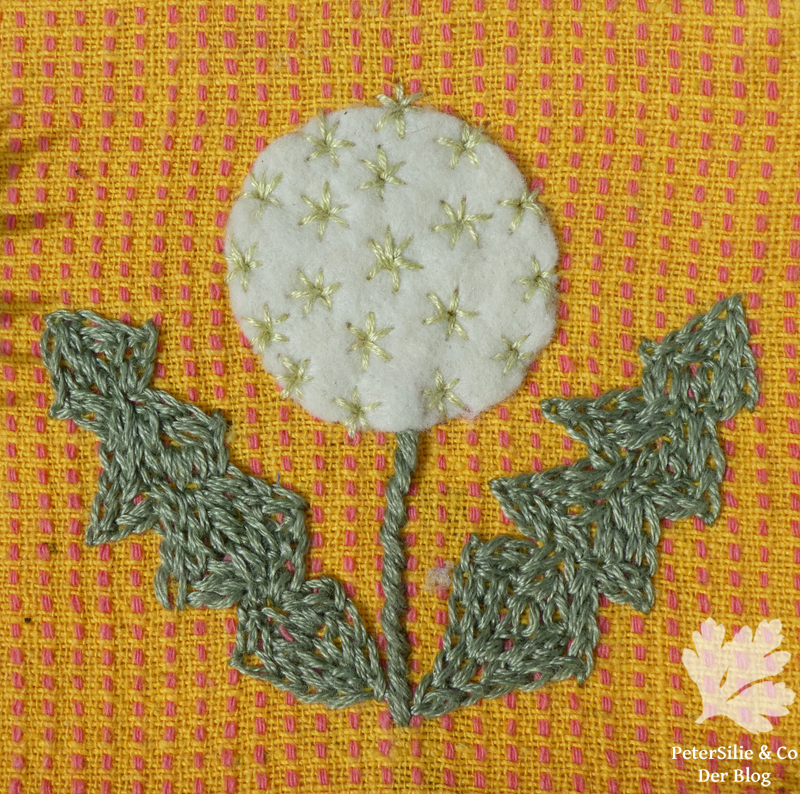 Stickerei mit Applikation aus Filz Löwenzahn