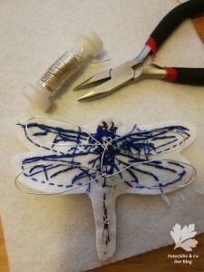 Libelle Hangestickt