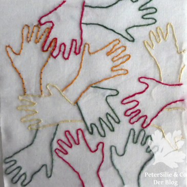 Stickerei Hände Couching Legetechnik