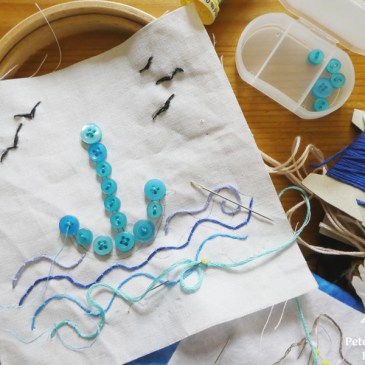 Anker Stickerei Couching Knöpfe Upcycling in Arbeit